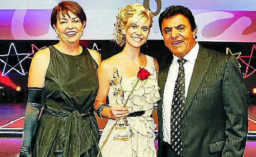 North Rocky Stefan Hair Fashions manager Danielle Duke receiving an award from Stefan and Premier Anna Bligh. North Rocky Stefan Hair Fashions manager Danielle Duke receiving an award from Stefan and Premier Anna Bligh.
